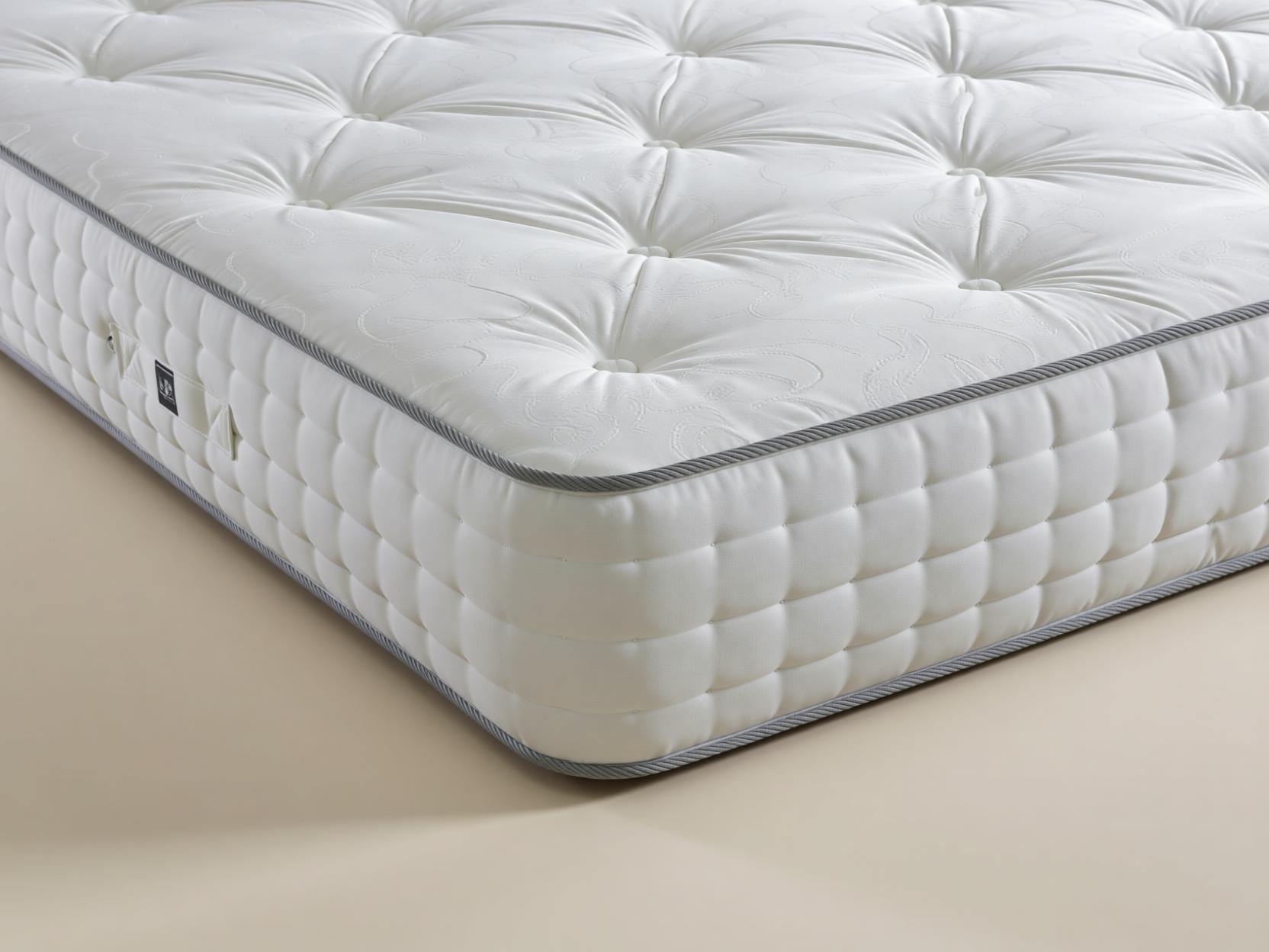 Sleep Comfi Blenheim 1000 pocket sprung mattress with plush surface and detailed stitching, showcasing comfort and support.